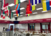 Flags are seen in a cafeteria.