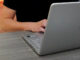 A 2023 file photo of someone working on a laptop.