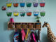 Children's backpacks and shoes are seen at a daycare franchise, in Langley, B.C., on May 29, 2018. The Association of Canadian Early Learning Programs says that several preschools in Alberta are on the verge of closing. THE CANADIAN PRESS/Darryl Dyck