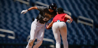 Claire Eccles is seen getting tagged out during a game being played at Nationals Park in Washington, D.C., as part of a tryout for players wanting to be part of the Women's Pro Baseball League.