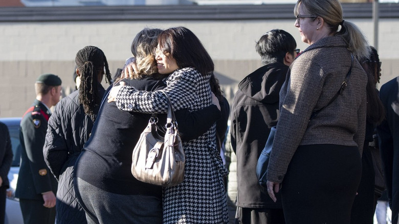 Mourners leave a funeral for Sgt. Morgan Wong at Park Memorial Funeral Home on Oct. 25 in Edmonton. Wong was one of the four Canadian Armed Forces members killed last week in the CFB Wainwright fire Photo by Greg Southam / 10113056A