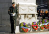 Morgan Xishen Wong stands guard at the cenotaph in front of Edmonton City Hall during a Remembrance Day ceremony on Nov. 11, 2022. Photo by Larry Wong / Postmedia
