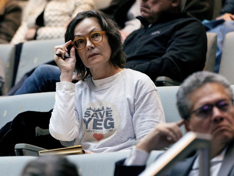 Edmontonians watch a special City Council meeting on infill, in Edmonton Friday Oct. 16, 2026.
